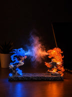 Akaza vs Rengoku Mist Diffuser Figure – lit with mist in a room at night | Demon Slayer