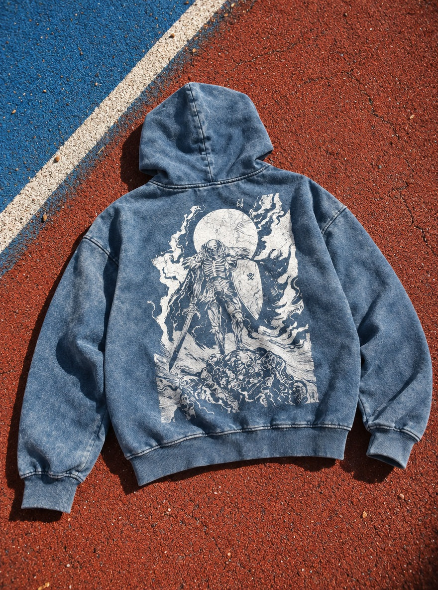 Blue Faded Hoodie – Skull Knight Sunset – flat-lay | Berserk