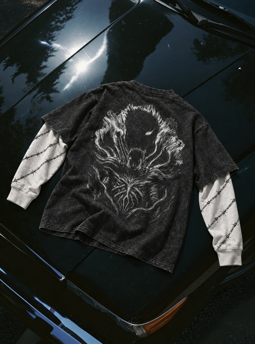 Looming Beast – Double Sleeves – flat-lay | Berserk