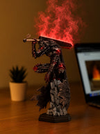 Guts Berserker Armor Mist Diffuser Figure – lit with mist in a daylight room | Berserk
