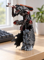 Guts Berserker Armor Figure – on a desk | Berserk