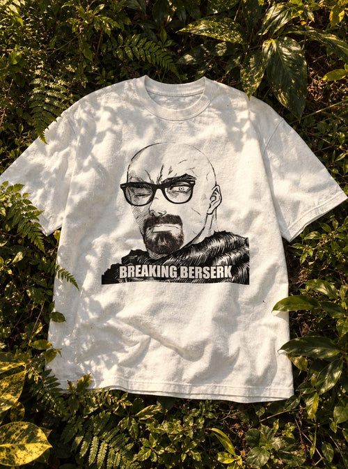 Breaking Berserk – White Tee – flat-lay | Meme Tees