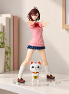 Momo & Lucky Cat Figure – on a display shelf | Dandadan