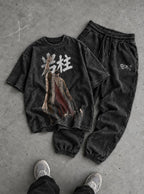 Cool Black Tee & Joggers Combo – Stone Pillar – flat-lay | Demon Slayer