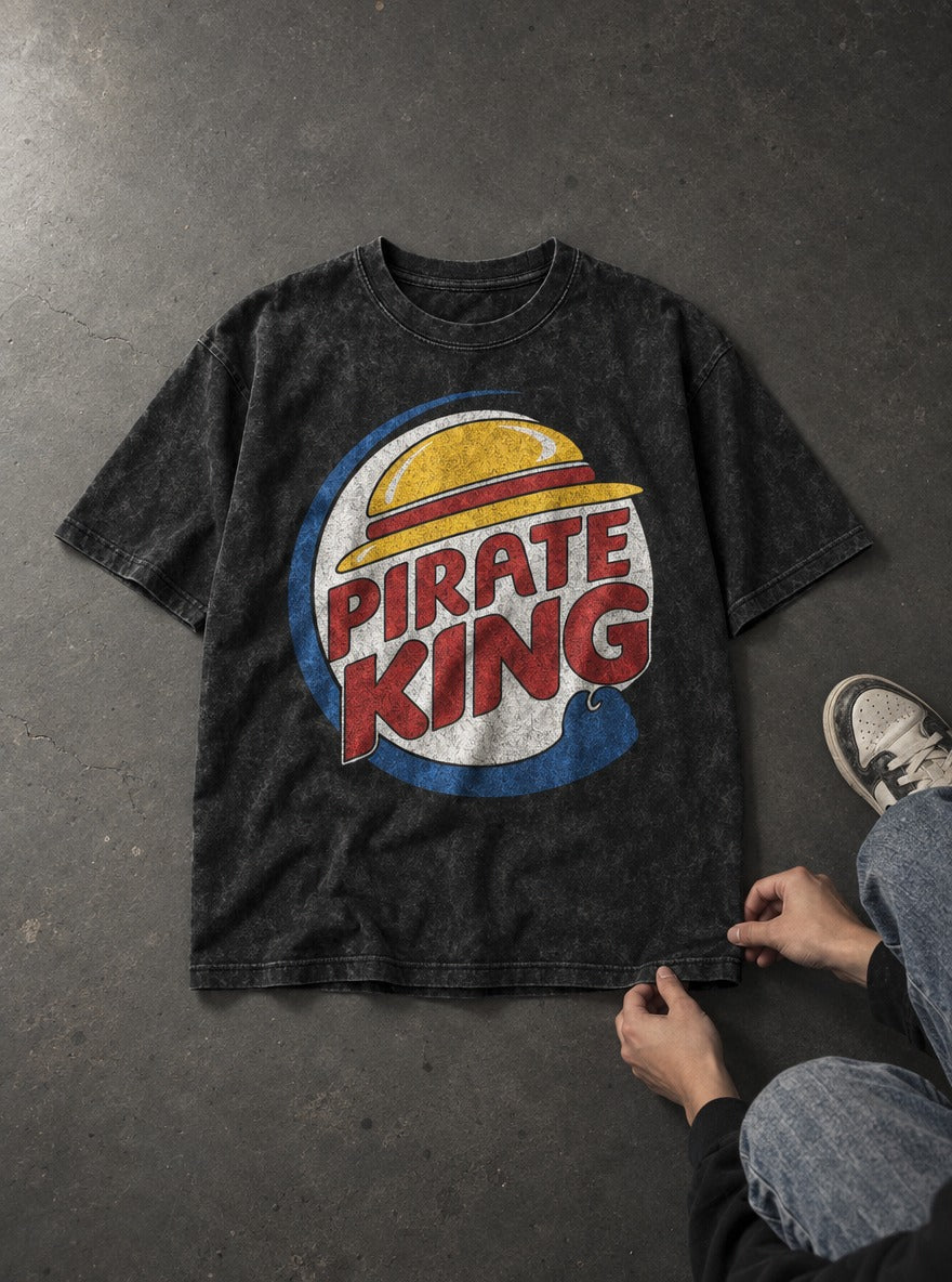 Pirate King – Black Acid Wash Tee – flat-lay | Meme Tees