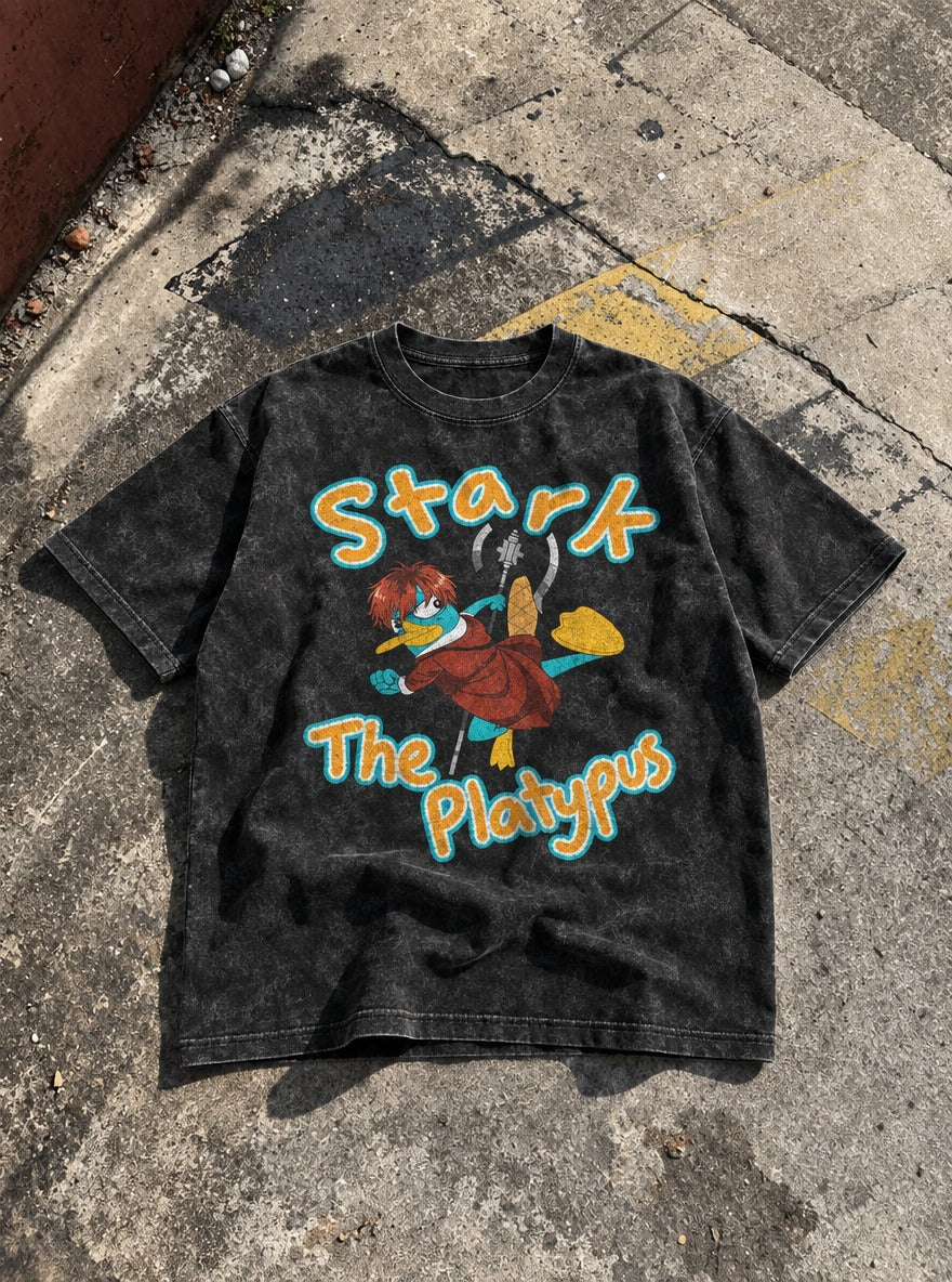 Stark the Platypus – Black Acid Wash Tee – flat-lay | Meme Tees
